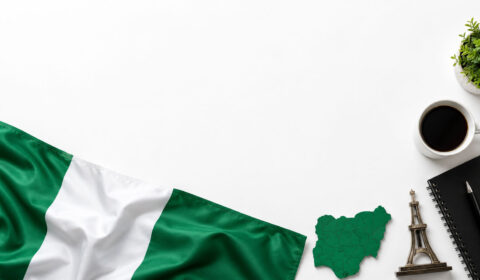 Minimalist office scene with Nigerian flag